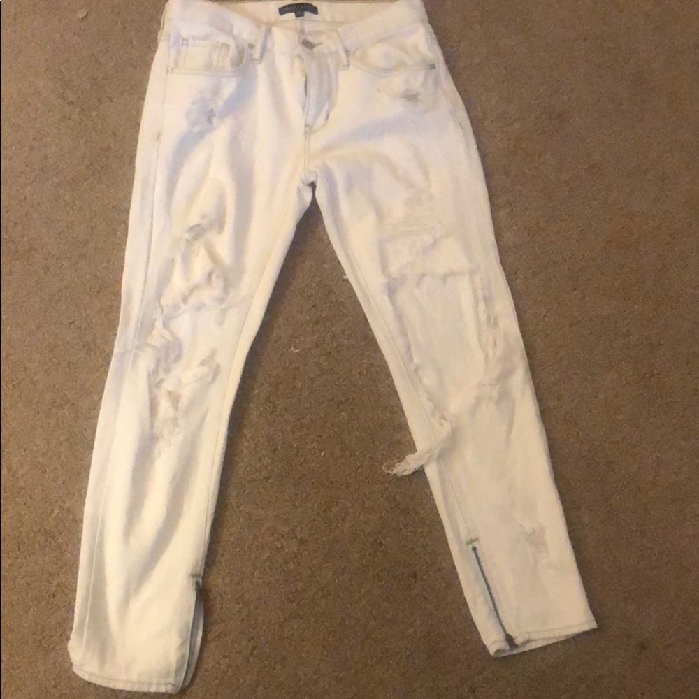 White ripped jeans